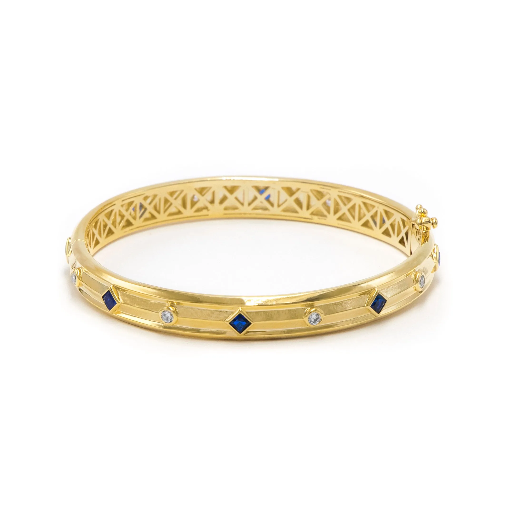 Brazalete cerrado zirconias azul - chapa de oro 14k